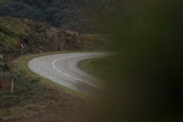 hidden bend on a road Ross Woodhall - Action & Lifestyle Photography