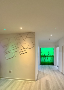 entrance to studio space showing a green screen in the distance Ross Woodhall - Action & Lifestyle Photography